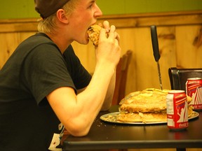 Mason Gloade, 18, from Brucefield attempted the food challenge at Johnny's Sub & Sandwich. He ate about one quarter of seven pounds of food.(Shaun Gregory/Huron Expositor)