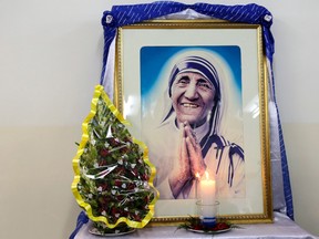 A portrait of late Mother Teresa is placed near her tomb at the Missionaries of Charity Mother house in Kolkata, India.