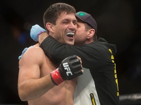 Demian Maia, of Brazil, celebrates after defeating Carlos Condit during a welterweight bout during a UFC Fight Night event in Vancouver on Saturday, August 27, 2016. THE CANADIAN PRESS/Darryl Dyck