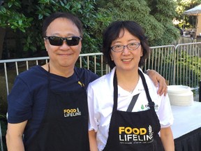 Jeffrey Pang/For The Sudbury Star 
Prof. Jeffrey Pang and his wife, Catherine Pang, at their home in Seattle, volunteering for Food Life Line, the food ank in Seattle. They have become known worldwide on YouTube for their recipes.