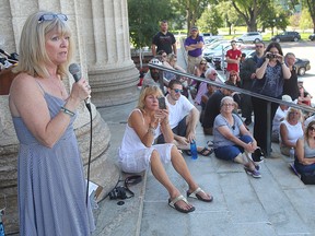 Rally organizer Bonnie Bricker speaks during a mental health rally in Winnipeg, Man. Sunday August 28, 2016. (Brian Donogh/Winnipeg Sun/Postmedia Network)