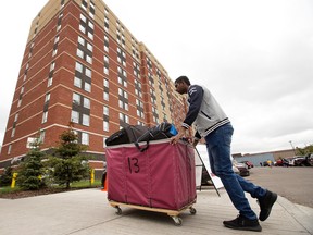Dhaneshwaran Moonian, 20, from Mauritius (an island nation in the Indian Ocean) moves into the MacEwan University student residence,1016 Wanyandi Way (110 street and 105 avenue), in Edmonton on Sunday Aug. 28, 2016. Approximately 725 students moved into the residence on Sunday. DAVID BLOOM / Postmedia