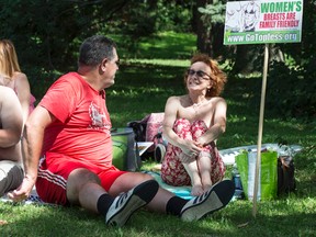 Several women marked GoTopless Day in High Park on Sunday. (CRAIG ROBERTSON, Toronto Sun)