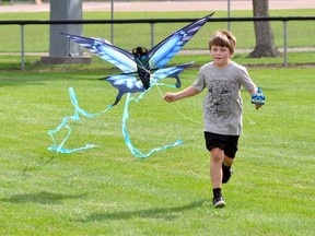 The term “go fly a kite” was taken literally for a few kids, including Jack Bree, 9, last Wednesday afternoon, Aug. 24, who gathered at the open ball diamonds at Keterson Park to try and take advantage of the soothing summer wind. Unfortunately, the winds were intermittent and the kids did more running than flying, but a few managed to sustain their flights for more than a few seconds. ANDY BADER MITCHELL ADVOCATE