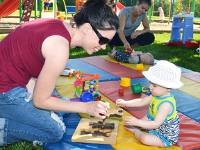 Tess McDougall and her mom Lisa spent some time together in the sun at Lions Park last Friday morning, Aug. 26, during the Perth Care For Kids Sizzling Summer celebration. With the Labour Day weekend on the horizon, it means that school is just around the corner, although not for a year or two year for a lot of the youngsters who attended the event which also involved getting a little wet at the splash pad. GALEN SIMMONS MITCHELL ADVOCATE