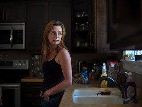 Shannon Graham poses in her home in Bridgewater, N.S. on Saturday, August 27, 2016. Graham says she regrets reporting her sexual assault to the police and says she wants to let people know how the criminal justice system works. THE CANADIAN PRESS/Darren Calabrese