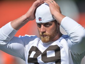 Cleveland Browns linebacker Paul Kruger stands on the field during practice at the NFL football team's training camp Monday, Aug. 1, 2016, in Berea, Ohio. (AP Photo/David Richard)