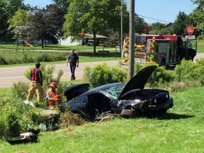 Emergency crews had to cut a man out of his vehicle after a single-car crash on Longwoods Road Monday. Derek Ruttan, The London Free Press