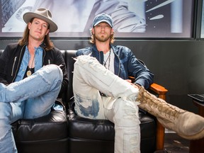 Tyler Hubbard (left) and Brian Kelley of Florida Georgia Line, pose for a photo in Toronto on Monday August 22, 2016. (Ernest Doroszuk, Postmedia Network)