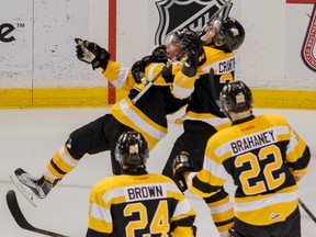 Kingston Frontenacs Zack Dorval, left, and Ryan Cranford celebrate Dorval’s goal during Ontario Hockey League action at the Rogers K-Rock Centre last season. Dorval and Cranford are looking forward to playing bigger roles on the team this season. (Julia McKay/Whig-Standard file photo)