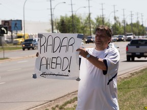 Jack Shultz was fined $500 for warning drivers of upcoming speed traps but plans to fight the ticket in court and continues to warn motorist about photo radar on May 3, 2016 in Edmonton.