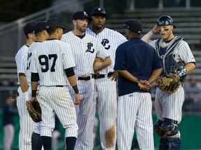 The London Majors infielders listen as manager Roop Chanderdat talks to them during an Intercounty Baseball League playoff game against the Toronto Maple Leafs at Labatt Park in London, Ont. on Tuesday August 23, 2016. (Free Press file photo)
