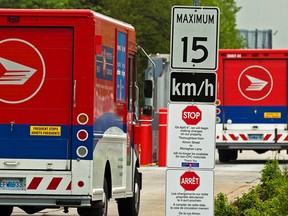Postal vans arrive at the post office in Halifax on Monday, May 30, 2011. It appears contract talks at Canada Post have stalled as a strike mandate for more than 51,000 members of the Canadian Union of Postal Workers is set to expire. THE CANADIAN PRESS/Andrew Vaughan