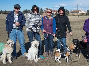 Ken Zahara, Janie Zahara, Lisa Van Osch, Elise Hetu, Sujatha Fernando are part of a  group of off-leash dog park users wants to get a fence around the Grand Trunk off-leash park. A committee is trying to get the city to remedy that in Edmonton April 12, 2015.