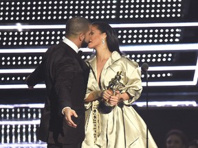 Drake presents Rihanna with the The Video Vanguard Award during the 2016 MTV Video Music Awards at Madison Square Garden on August 28, 2016 in New York City.  (Photo by Michael Loccisano/Getty Images)