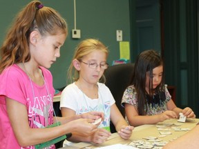 Elementary school students create words during an activity at the Ready, Set, School day camp.
CARL HNATYSHYN/SARNIA THIS WEEK