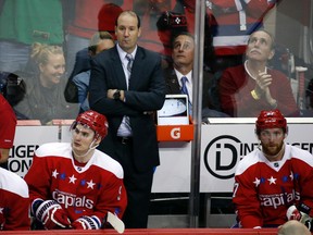 Washington Capitals assistant coach Todd Reirden stands in the bench area in the third period of an NHL hockey game against the Pittsburgh Penguins, in Washington. (AP/Alex Brandon)