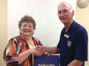 Tillsonburg Rotary president Brian Clark presents the Paul Harris Fellowship Award to Laurel Beechey. (CONTRIBUTED PHOTO)