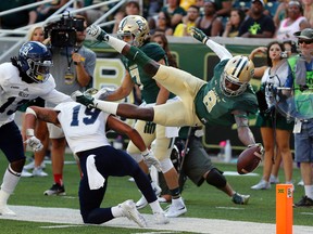 Baylor wide receiver Ishmael Zamora (8) scores a touchdown during NCAA football action in Waco, Texas, on Sept. 26, 2015. Zamora was suspended three games for beating his dog. (Rod Aydelotte/AP Photo/Files)