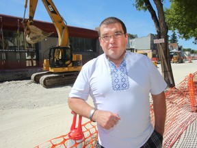 Ruslan Zeleniuk, owner of Svitoch Ukrainian Imports, stands by the road construction on Selkirk Avenue in Winnipeg Aug. 30, 2016. Zeleniuk is upset that the road construction has slowed his business.