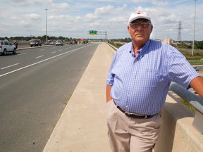 Dennis Alsop Jr. stands on the Wellington Road bridge over Highway 401, the last place 15-year-old Jackie English was seen alive, getting into a car back in 1969. The English case stayed in his father's mind for the rest of his career, as shown in his diaries, that Alsop Jr. gave to the OPP two years ago. Alsop is suing the OPP for his dad's diaries. (MIKE HENSEN, The London Free Press)