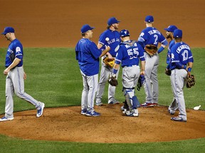 Toronto Blue Jays starting pitcher J.A. Happ walks off the field after being relieved in the seventh inning of a baseball game against the Baltimore Orioles on Aug. 30, 2016. (AP Photo/Patrick Semansky)