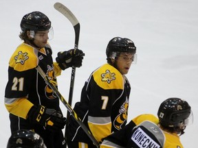 From left, Filip Helt, Franco Sproviero and Travis Konecny celebrate Sproviero's first goal for Team Black at Progressive Auto Sales Arena on Tuesday, Aug. 30, 2016 in Sarnia, Ont.  Sproviero scored twice but Team White won the scrimmage 8-7 in a shootout. (Terry Bridge/Sarnia Observer)