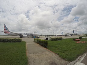 In this Friday, June 10, 2016, file photo, American Airlines and JetBlue Airways charter flights wait to depart from Havana's Jose Marti International Airport. The first commercial flight between the U.S. and Cuba in more than half a century is scheduled to fly from Fort Lauderdale, Fla., to the central city of Santa Clara Wednesday, Aug. 31, re-establishing regular air service severed at the height of the Cold War. (AP Photo/Scott Mayerowitz, File)