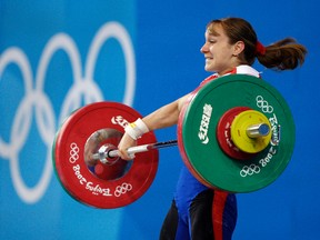 Marina Shainova, who won silver in the 58-kilogram class, and Nadezhda Evstyukhina, bronze medalist in the 75-kg division, were among 10 Russian medalists from Beijing who reportedly tested positive last month in IOC reanalysis of their stored samples. (AP Photo/Andres Leighton, file)