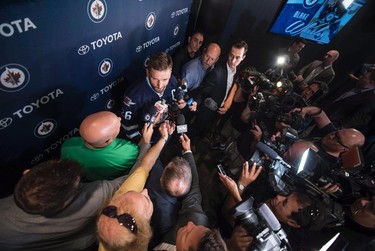 Winnipeg Jets' new captain Blake Wheeler speaks to the media during a press conference in Winnipeg on Wednesday, August 31, 2016. THE CANADIAN PRESS/David Lipnowski