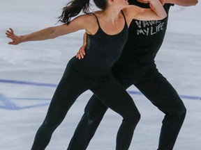 Figure skaters Tessa Virtue and Scott Moir work out on the ice at the Hershey Centre in Mississauga Wednesday, August 31, 2016. (Dave Thomas/Toronto Sun/Postmedia Network)