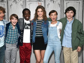 Actors from left to right, Gaten Matarazzo, left, Noah Schnapp, Caleb McLaughlin, Natalia Dyer, Millie Bobby Brown and Finn Wolfhard participate in the BUILD Speaker Series to discuss the Netflix series, "Stranger Things", at AOL Studios on Wednesday, Aug. 31, 2016, in New York. (Photo by Evan Agostini/Invision/AP)