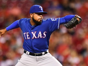 Jeremy Jeffress of the Texas Rangers pitches against the Cincinnati Reds at Great American Ball Park on August 23, 2016 in Cincinnati. (Jamie Sabau/Getty Images)