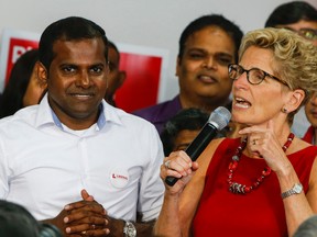 Ontario Premier Kathleen Wynne with Scarborough-Rouge River candidate Piragal Thiru July 16, 2016. (Dave Thomas/Toronto Sun)