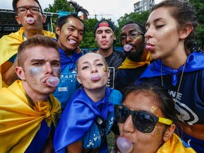 Participants blow gum bubbles as Ryerson University attempts to break a Guinness World Record Wednesday, August 31, 2016. (Dave Thomas/Toronto Sun)