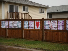 A handmade "Welcome Home" sign could be seen along Athabasca Avenue in Fort McMurray's Abasand neighbourhood on the first day of re-entry into standing homes in two of the most heavily damaged areas in the region, on Wednesday, August 31, 2016.
Olivia Condon/ Fort McMurray Today/ Postmedia Network