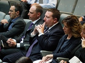 Northlands President & CEO Tim Reid, middle, and staff attended the meeting at Edmonton City Hall on Wednesday August 31, 2016 concerning the future of Northlands. LARRY WONG / Postmedia