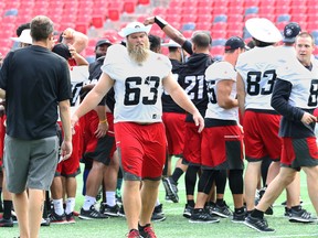 Redblacks offensive lineman Jon Gott sports some interesting headgear after the team’s walk-through. (Julie Oliver, Postmedia Network)