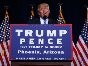 Republican presidential candidate Donald Trump delivers an immigration policy speech during a campaign rally at the Phoenix Convention Center, Wednesday, Aug. 31, 2016, in Phoenix. (AP Photo/Evan Vucci)