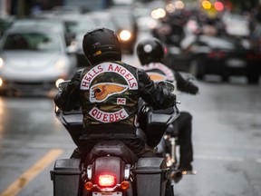 Members of the Hells Angels leave the funeral of Kenny Bedard, a member of the Hells Angels who was killed in a motorcycle crash on July 29, at the St-Charles Church in the Pointe-St-Charles neighbourhood in Montreal on Saturday, August 13, 2016. (Dario Ayala/Montreal Gazette)