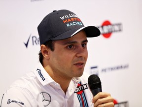 Felipe Massa of Brazil and Williams talks to the media in a press conference to announce his retirement from Formula 1 at the end of the 2016 season during previews for the Formula One Grand Prix of Italy at Autodromo di Monza on September 1, 2016 in Monza, Italy. (Mark Thompson/Getty Images)