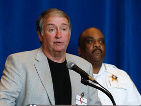 Retired Hammond, Ind., police detective Ronald Johnson, left, responds to a question as Chicago Police Supt. Eddie Johnson listens during a news conference Wednesday, Aug. 31, 2016, in Chicago. Johnson, who was Hammond's chief investigator in the now unsolved murder of Alexandra Anaya, 11 years ago, joined Chicago authorities and the FBI in appealing for the public's help in solving Anaya's murder. (AP Photo/Charles Rex Arbogast)