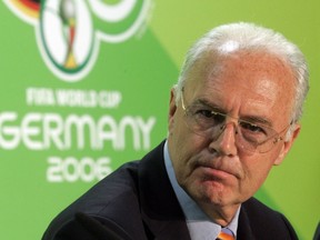 In this June 29, 2006 file photo Franz Beckenbauer, then President of the German Organization Committee of the soccer World Cup briefs the media during a news conference at the Olympic Stadium in Berlin. (AP Photo/Markus Schreiber)
