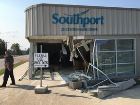 Someone drove a truck through the front of the Southport Airport and Commercial Properties building.