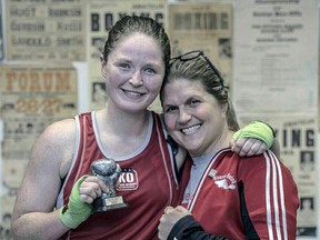 Kaitlyn Clark, left, is pictured with coach Jill Perry of the Beaver Boxing Club. Clark, a 23-year-old Sarnia native, was chosen by Perry to be part of a provincial women's boxing team that will train in Ireland for a week starting on Saturday. (Handout)