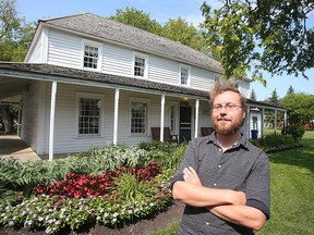 Eric Napier Strong, manager of the Seven Oaks House Museum, stands in one of the museum's rooms in Winnipeg, Man. Thursday Sept. 1, 2016. The museum is said to be haunted.