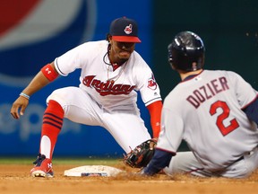 Cleveland Indians infielder Francisco Lindor tags out Minnesota Twins runner Brian Dozier Monday, Aug. 29, 2016, in Cleveland. (AP Photo/Ron Schwane)