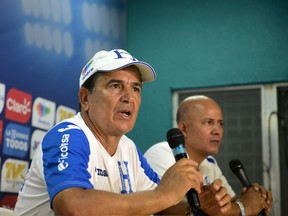Honduras coach Jorge Luis Pinto takes questions from the press in the Olimpico Metropolitano stadium in San Pedro Sula, Honduras on Sept. 1, 2016, ahead of Friday's CONCACAF qualifier match with Canada. (AFP PHOTO/ORLANDO SIERRA)