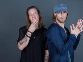 Tyler Hubbard, left, and Brian Kelley of Florida Georgia Line pose for a portrait on Thursday, Aug. 25, 2016, in New York. (Photo by Amy Sussman/Invision/AP)