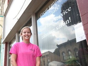 Alysha Kipfer, 21, stands in front of Madica Tan Lines in Seaforth September 1. She has recently purchased the business off the previous owner. (Shaun Gregory/Huron Expositor)